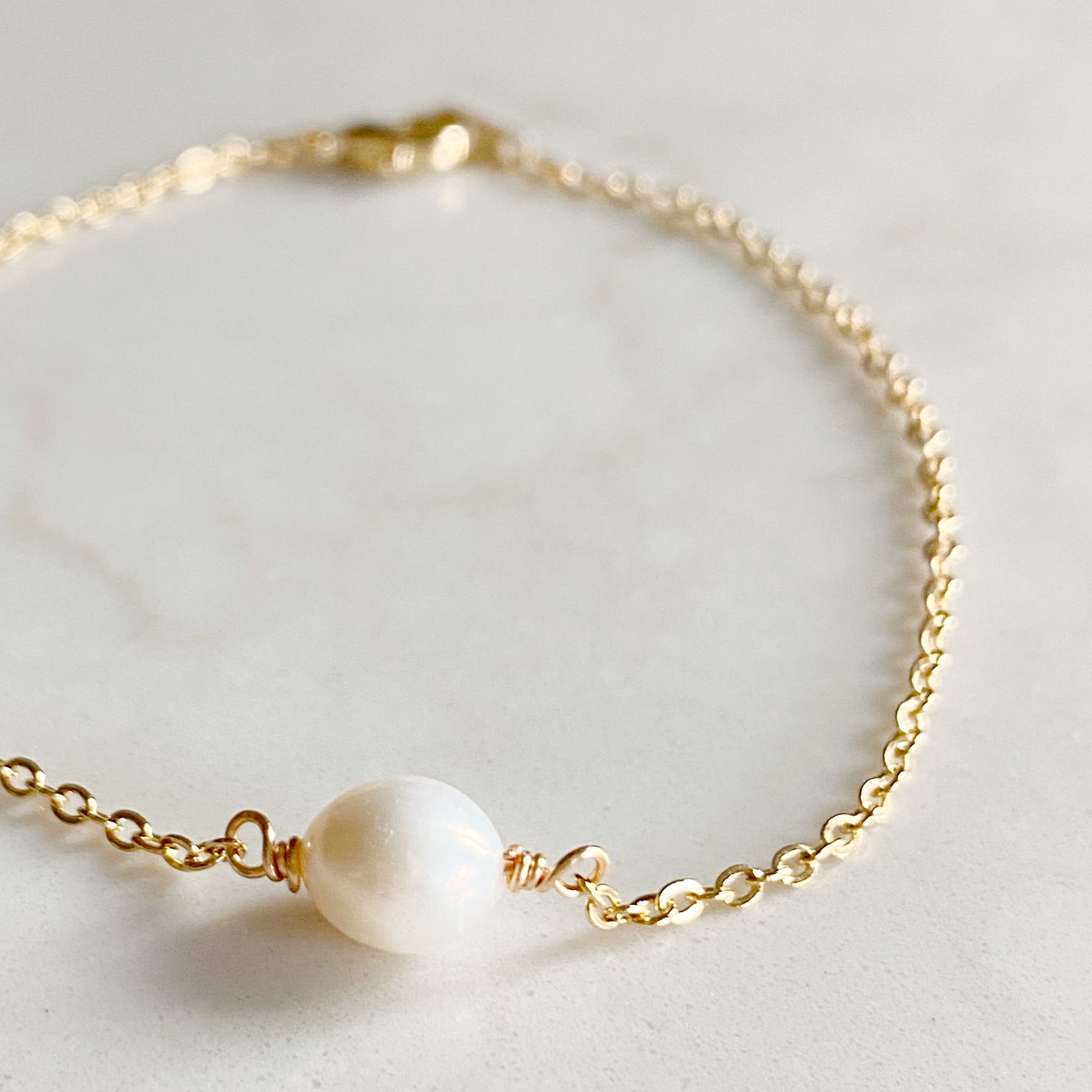 Pearl gold bracelet on sale design